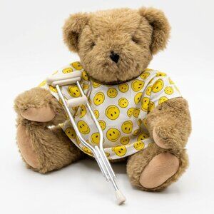 Vermont Teddy Bear 16” Jointed Get Well Bear in Smiley Hospital Gown with Crutch